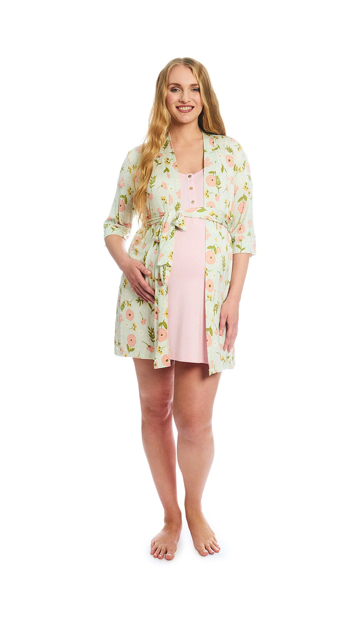Carnation Carolyn 2-Piece Set. Pregnant woman wearing 3/4 sleeve robe and short sleeve button front placket nightgown with hand on side of belly.
