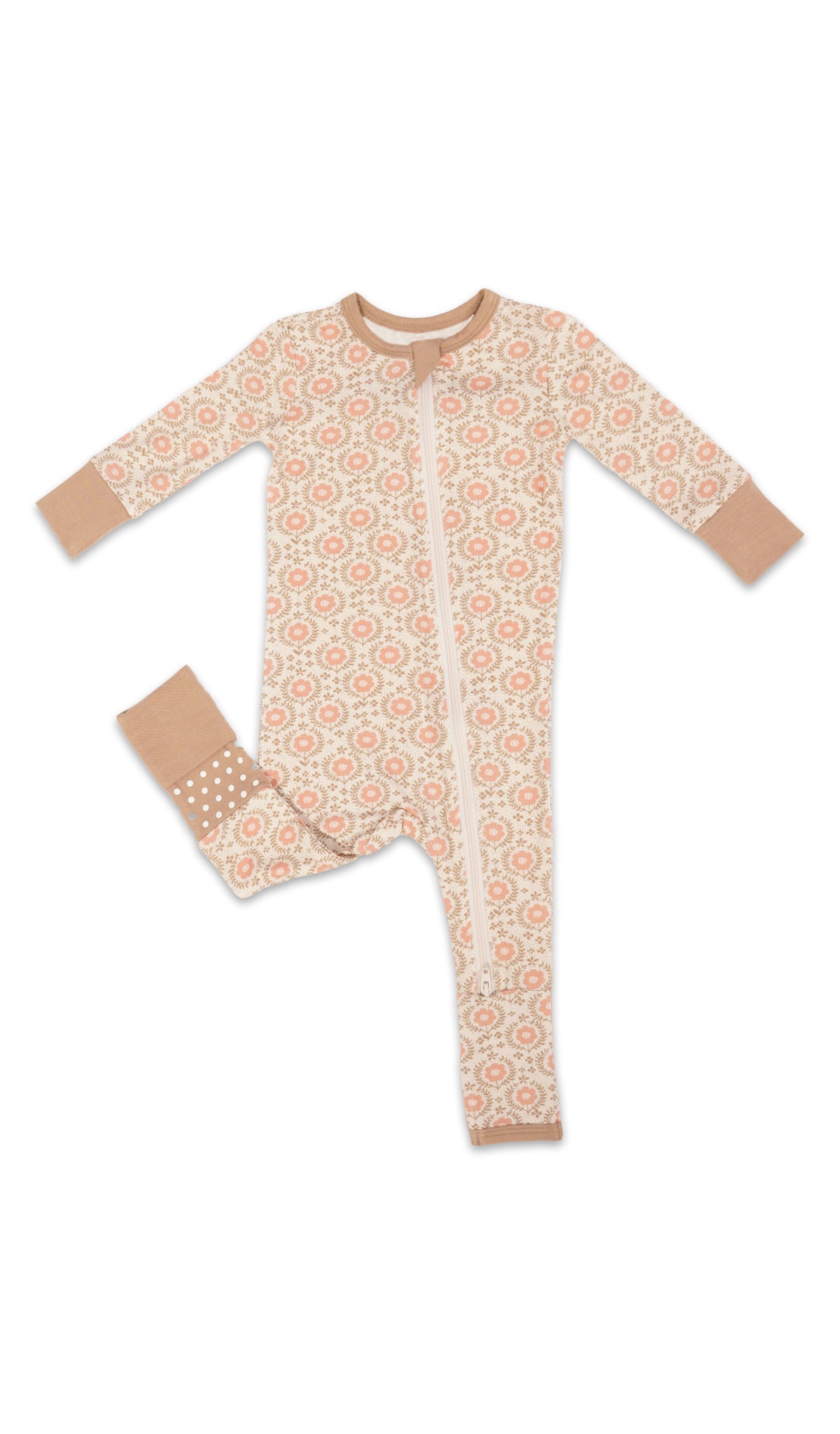 Bohemian Convertible Romper with long sleeves and zip front, one leg folded back to show the grippy sole on the footie.