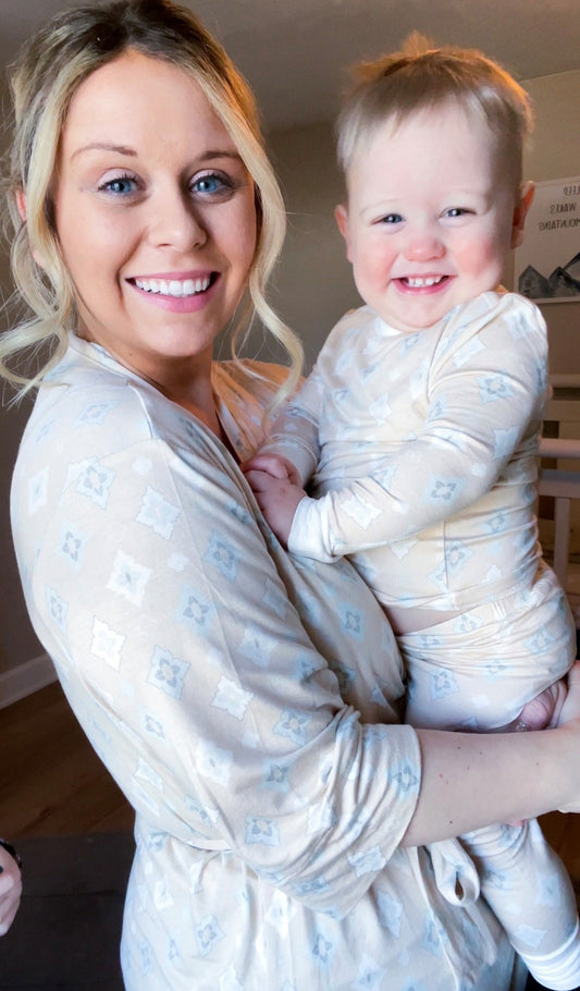 Mosaic Baby Kids 2-Piece Pant PJ worn by baby boy being held by his mom.