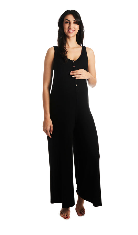 Black Luana romper. Pregnant woman with one hand on belly, wearing sleeveless wide-leg romper with scoop-neckline with button-front placket. 