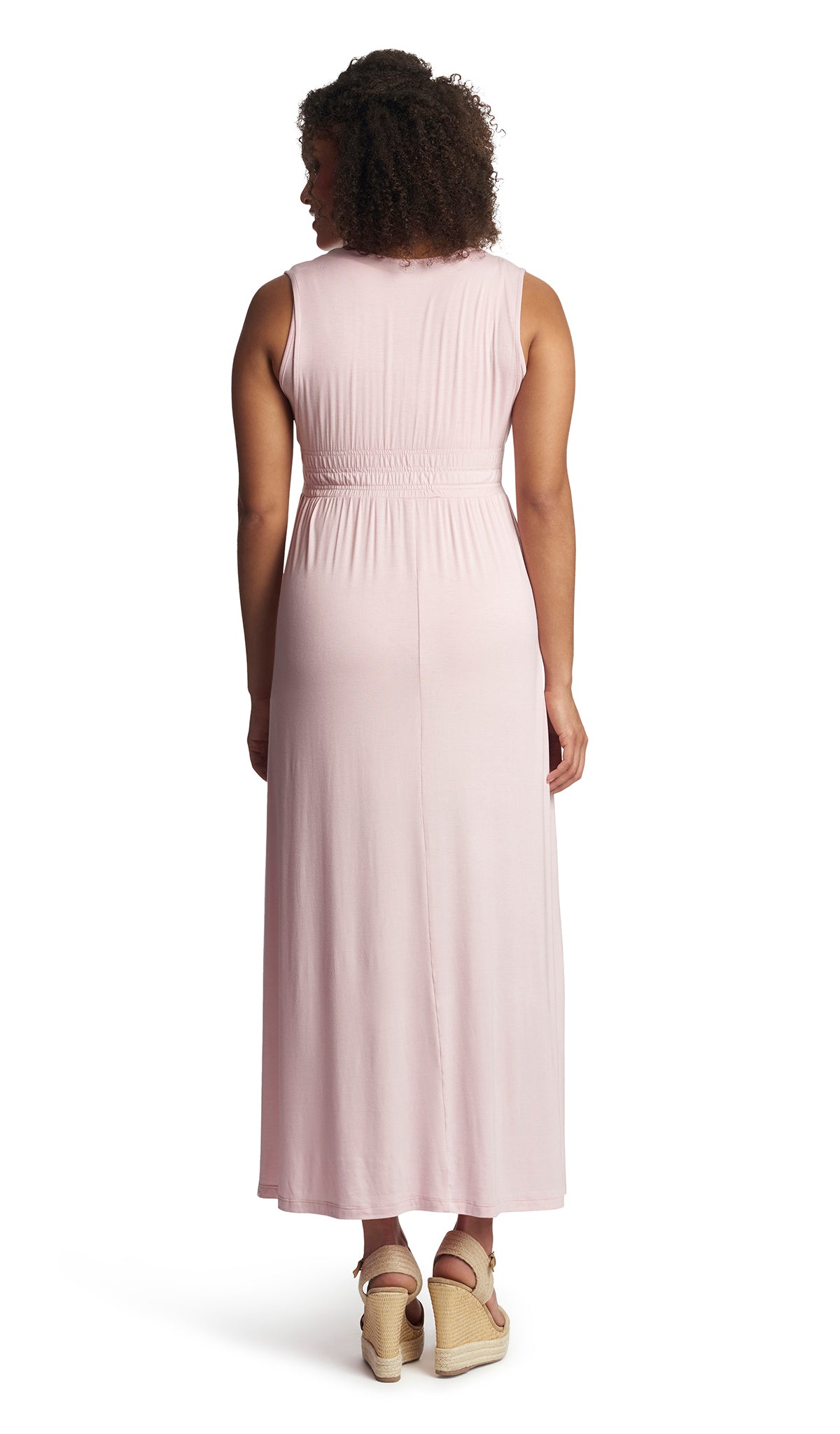 Blush Valeria back shot of dress worn by woman wearing wedge sandal heels.