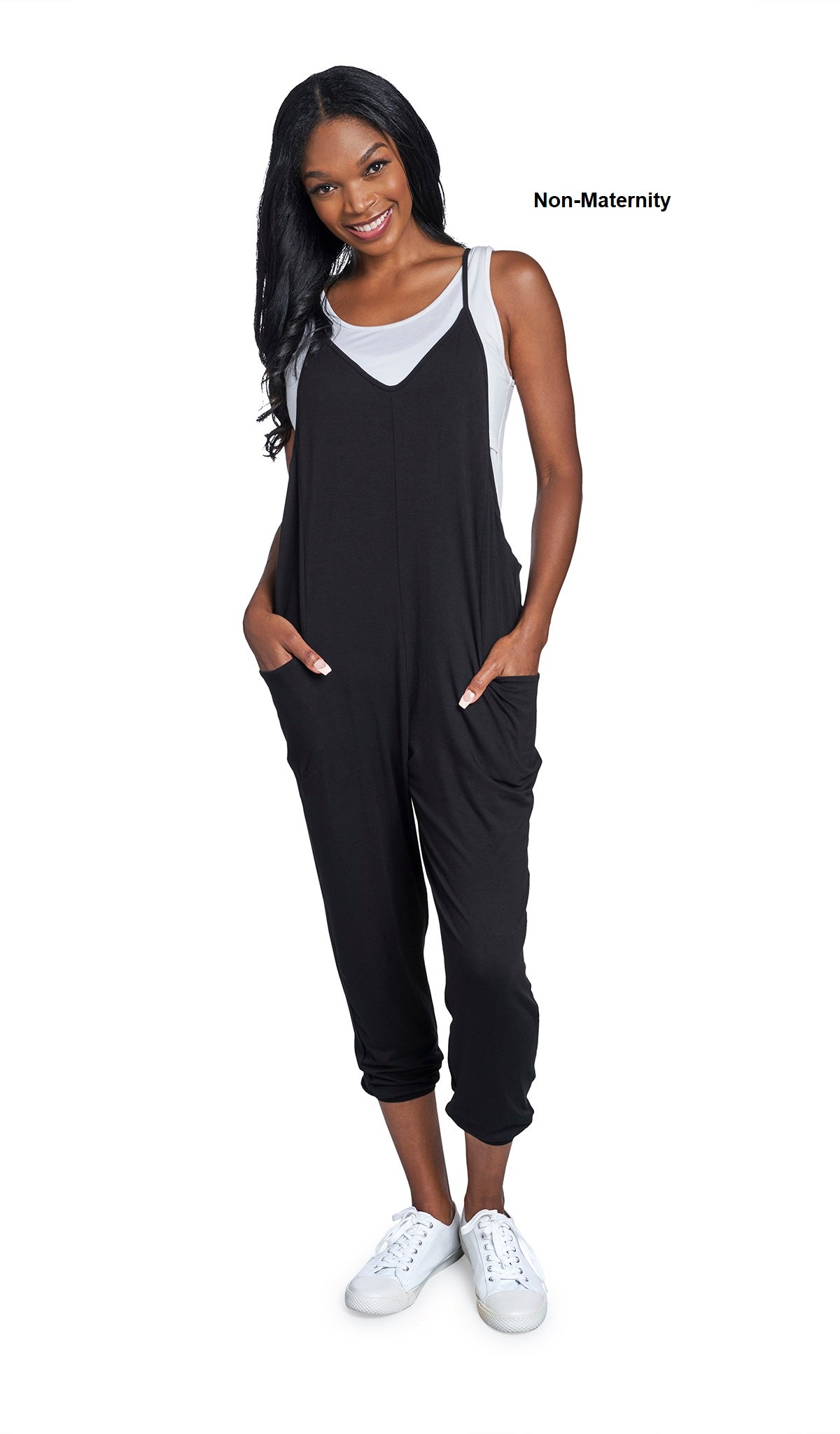 Black Brandi Romper. Woman wearing Brandi romper as non-maternity over white Kara tank and with tennis shoes.