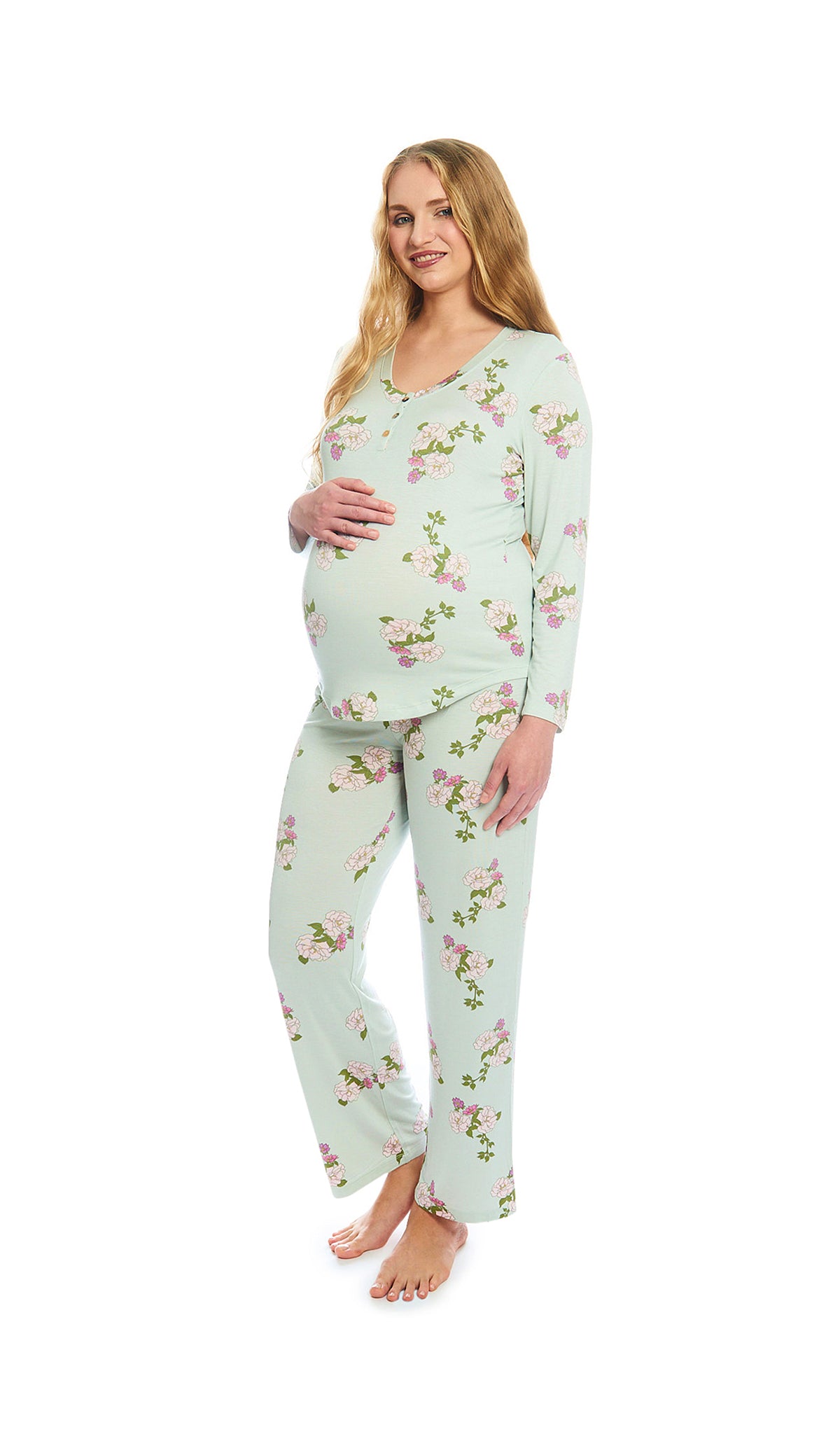 Peony Laina 2-Piece Set. Pregnant woman wearing button front placket long sleeve top and pant with one hand on belly.