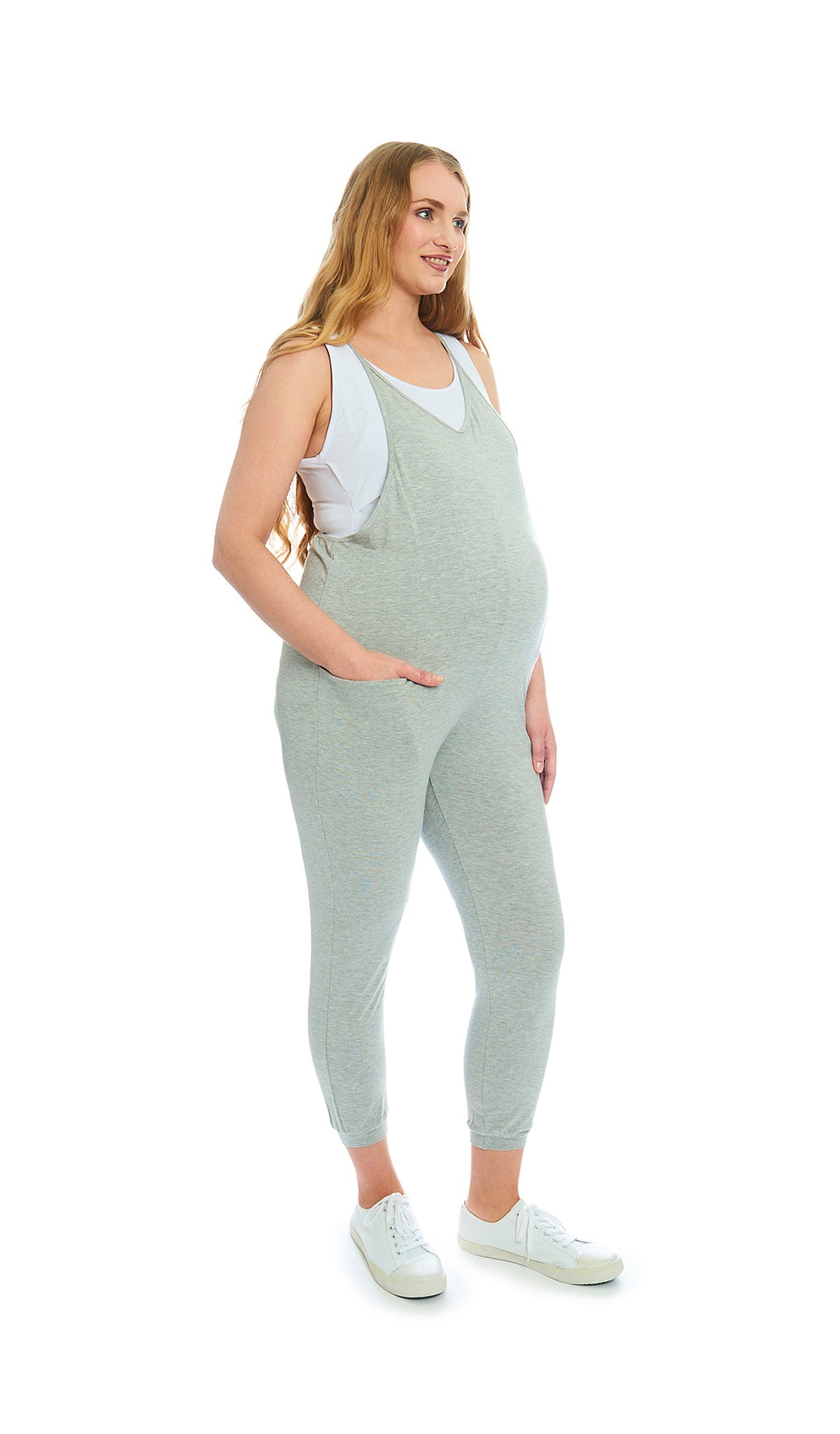 Heather Grey Solid Brandi Romper. Pregnant woman wearing Brandi romper over white Kara Tank and with tennis shoes.