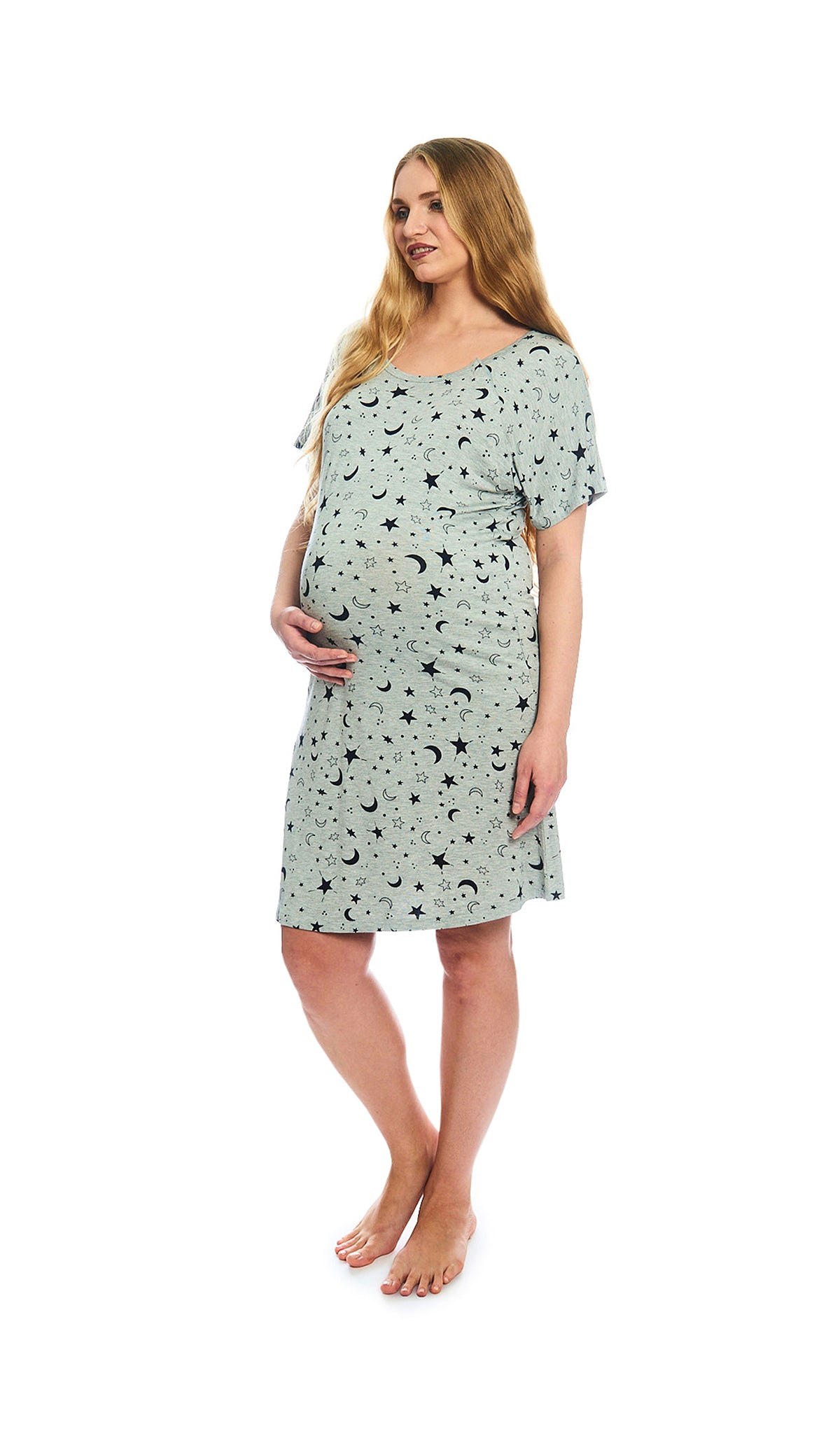 Twinkle Night Rosa hospital gown. Pregnant woman with one hand on belly, wearing hospital gown with scoop-neckline featuring dual snap openings. 