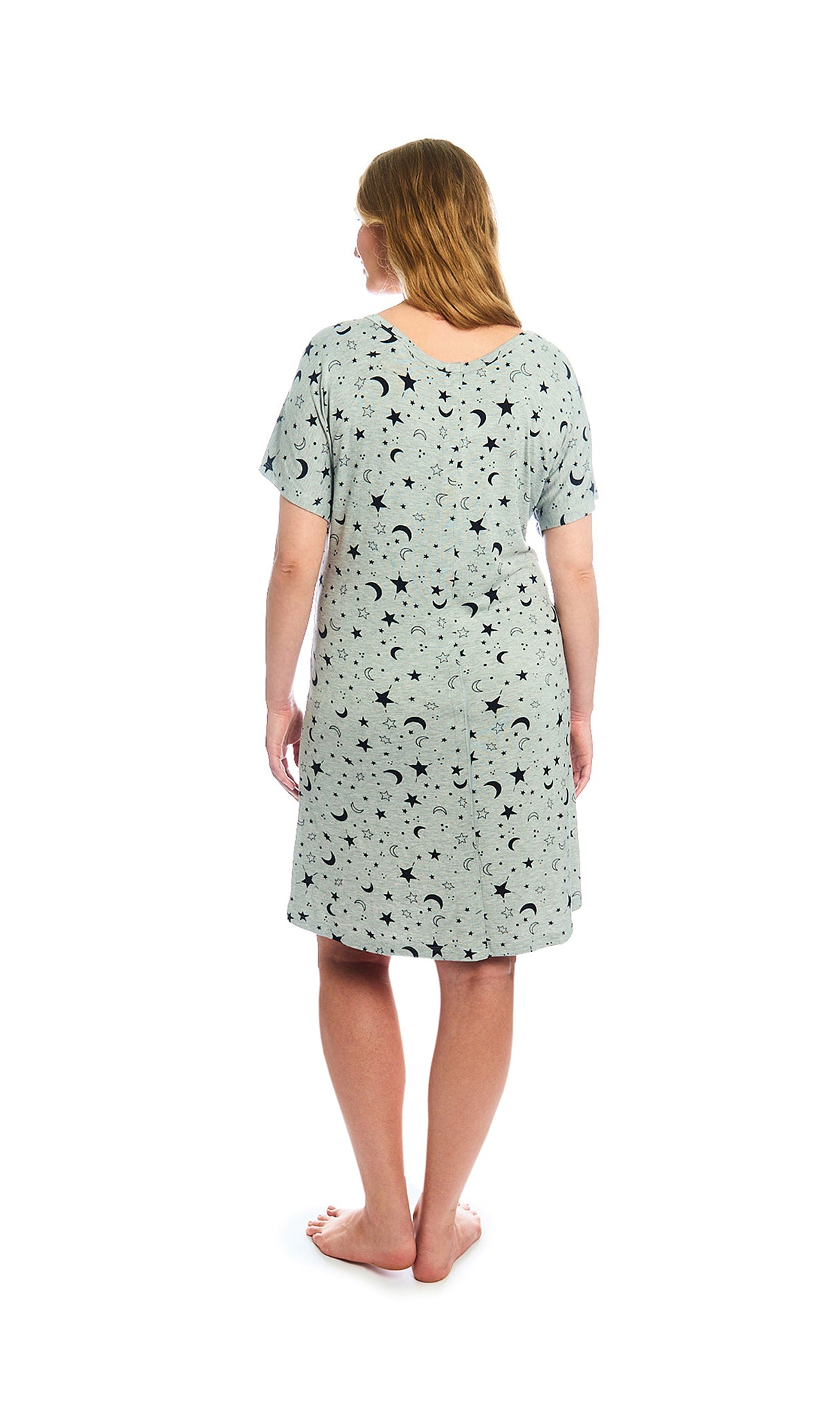 Twinkle Night Rosa hospital gown. Back shot of woman wearing hospital gown with full-length snap-back opening.