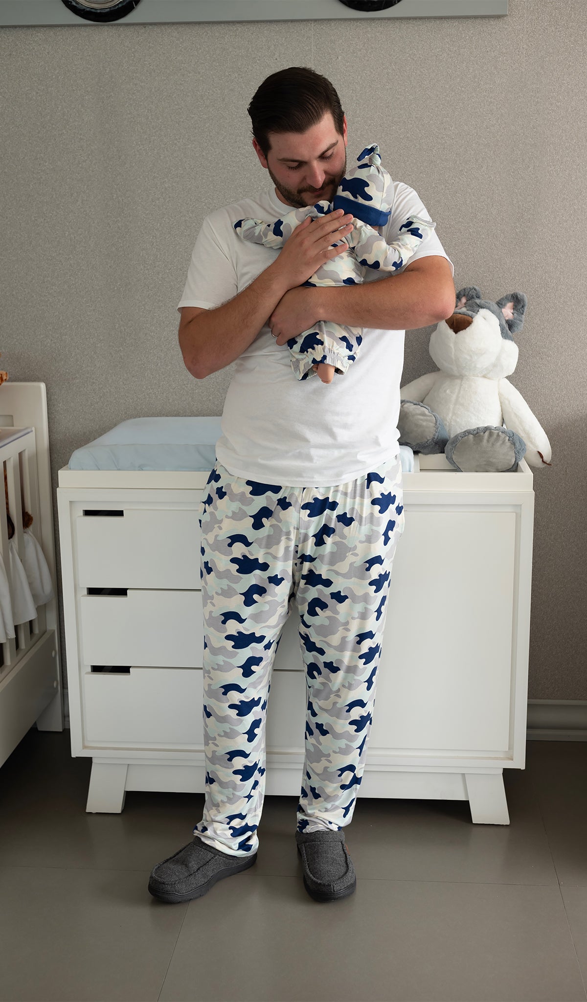 Camo Oliver Mens pants worn by dad holding his baby.