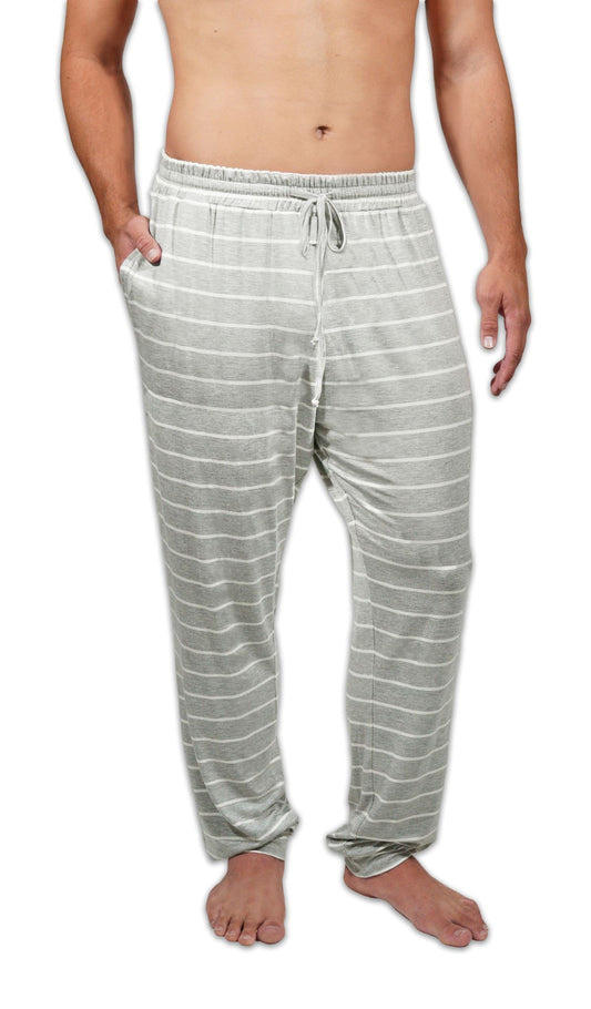 A man wearing light gray and white horizontally striped lounge pants, shown from the waist down against a plain white background.