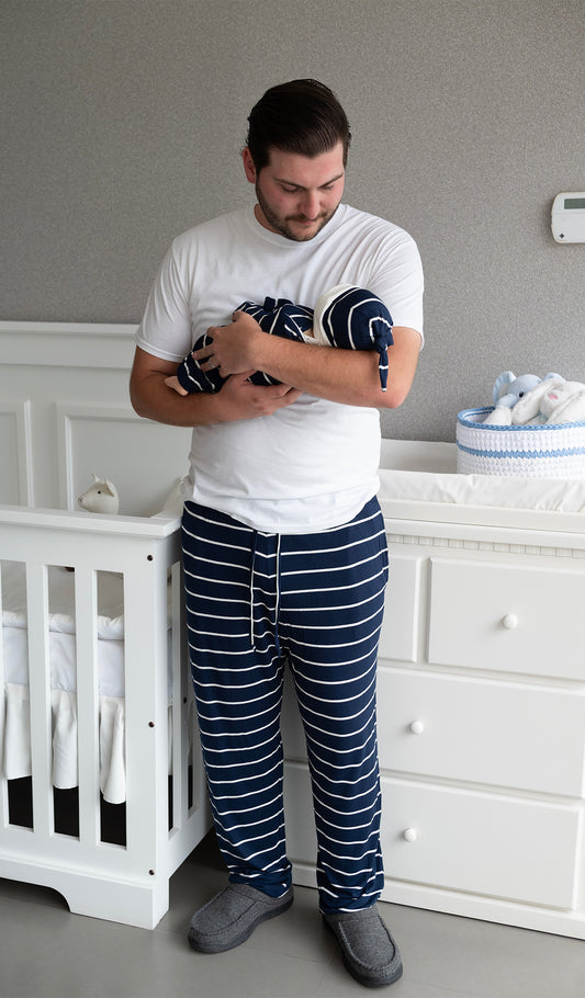 Navy Stripe Oliver Mens pants worn by father holding his baby.