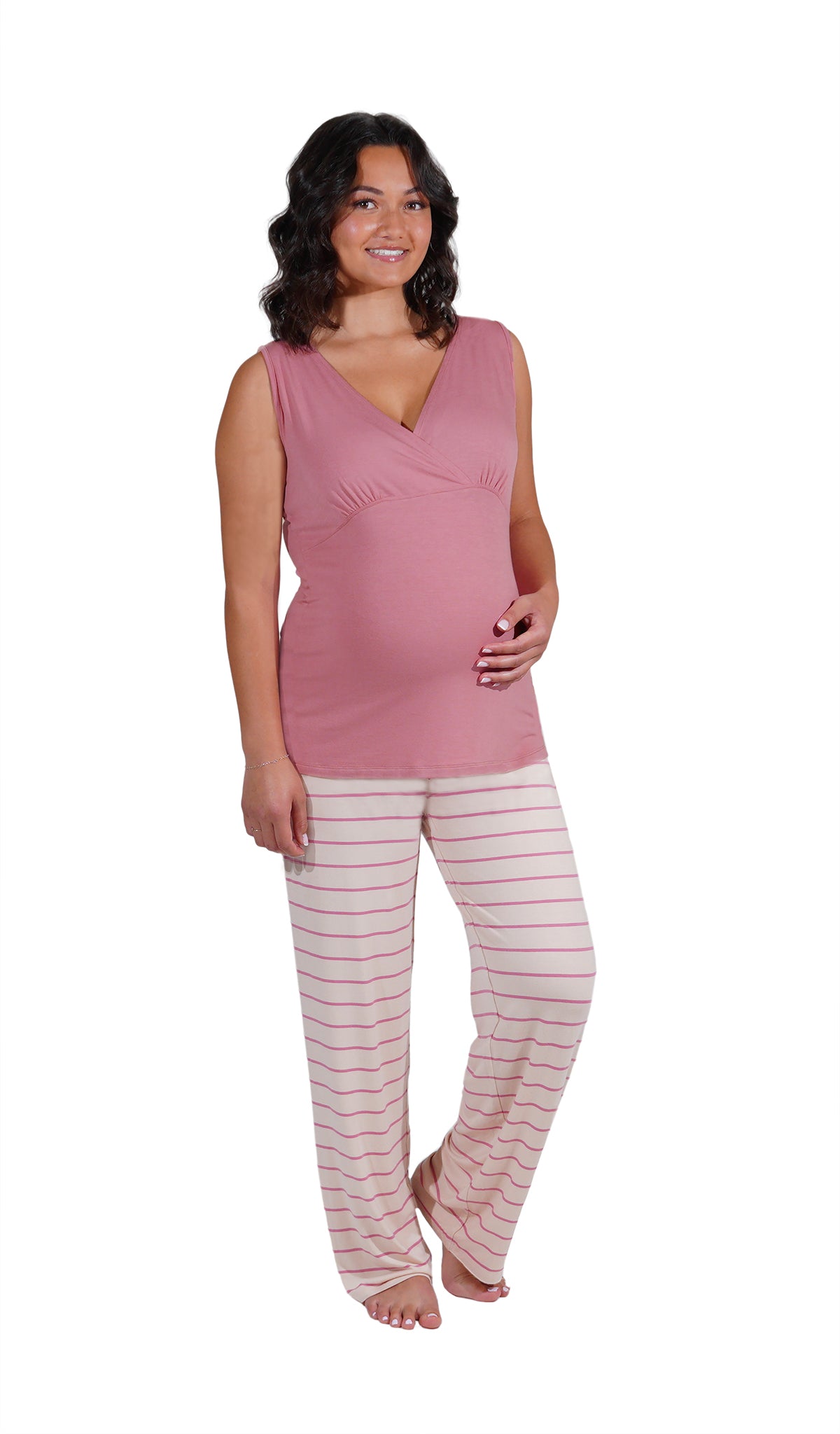 Pink Stripe Analise 5-Piece Set, pregnant woman wearing criss-cross bust tank top and pant with one hand on belly.