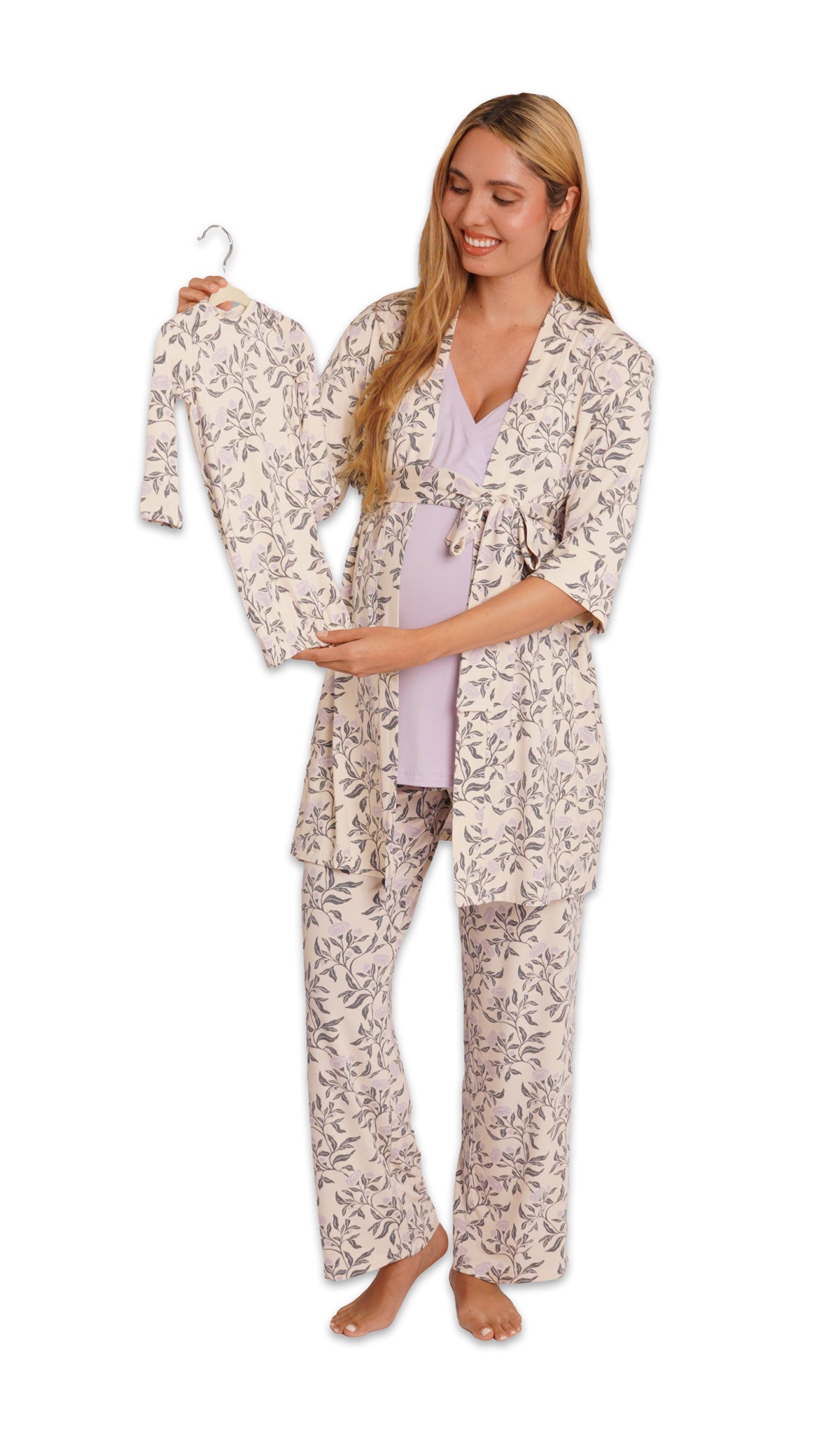 Poppy Analise 5-Piece Set. Pregnant woman wearing 3/4 sleeve robe, tank top and pant while holding a baby gown on hanger.