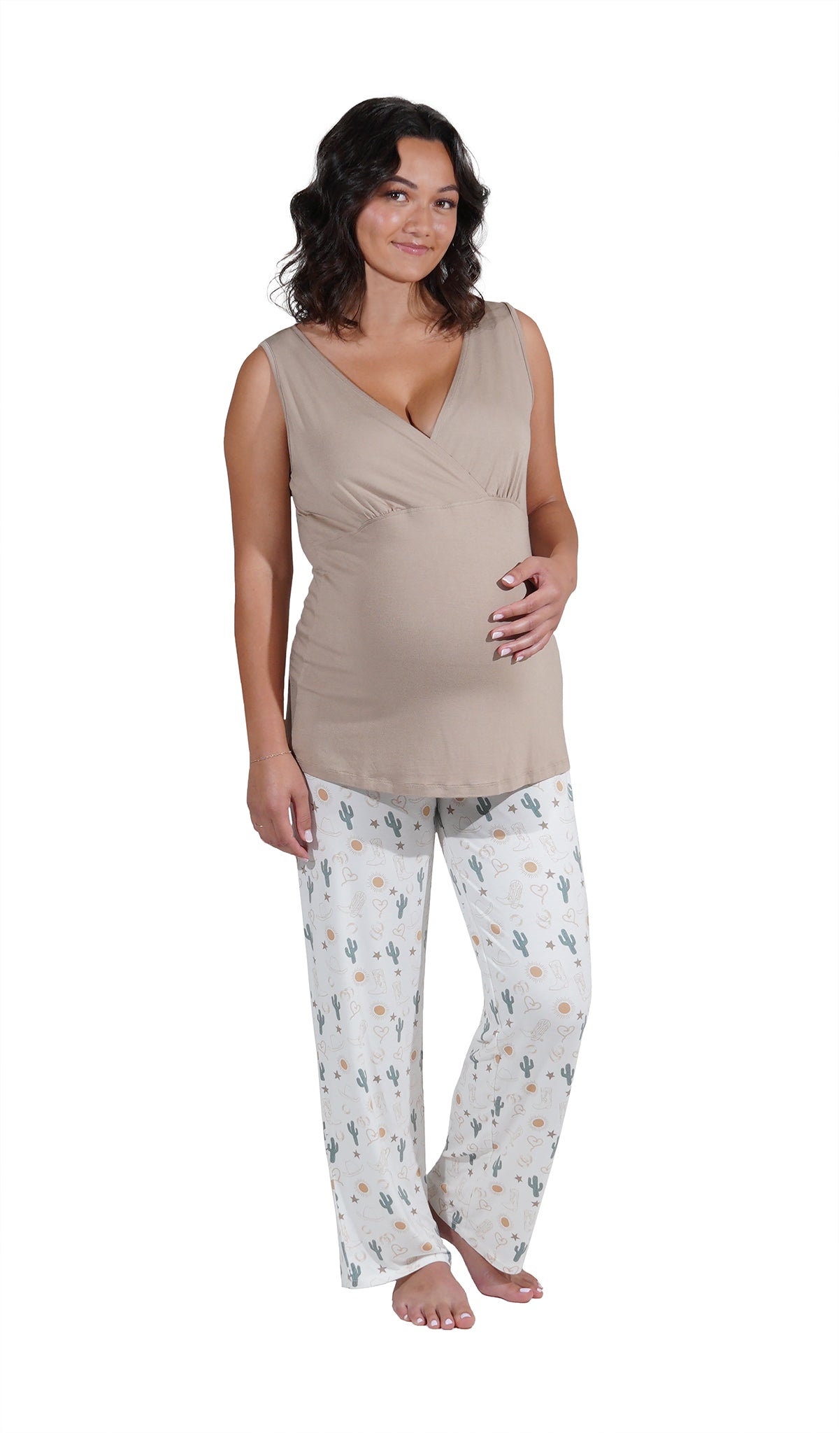 Rodeo Analise 3-Piece Set, pregnant woman wearing criss-cross bust tank top and pant with one hand on belly.