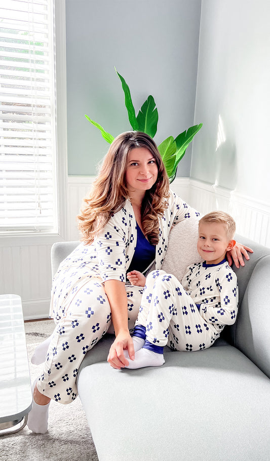 Geo Analise 3-Piece Set worn by mom sitting on couch next to her son wearing same print in Emerson kids PJ.