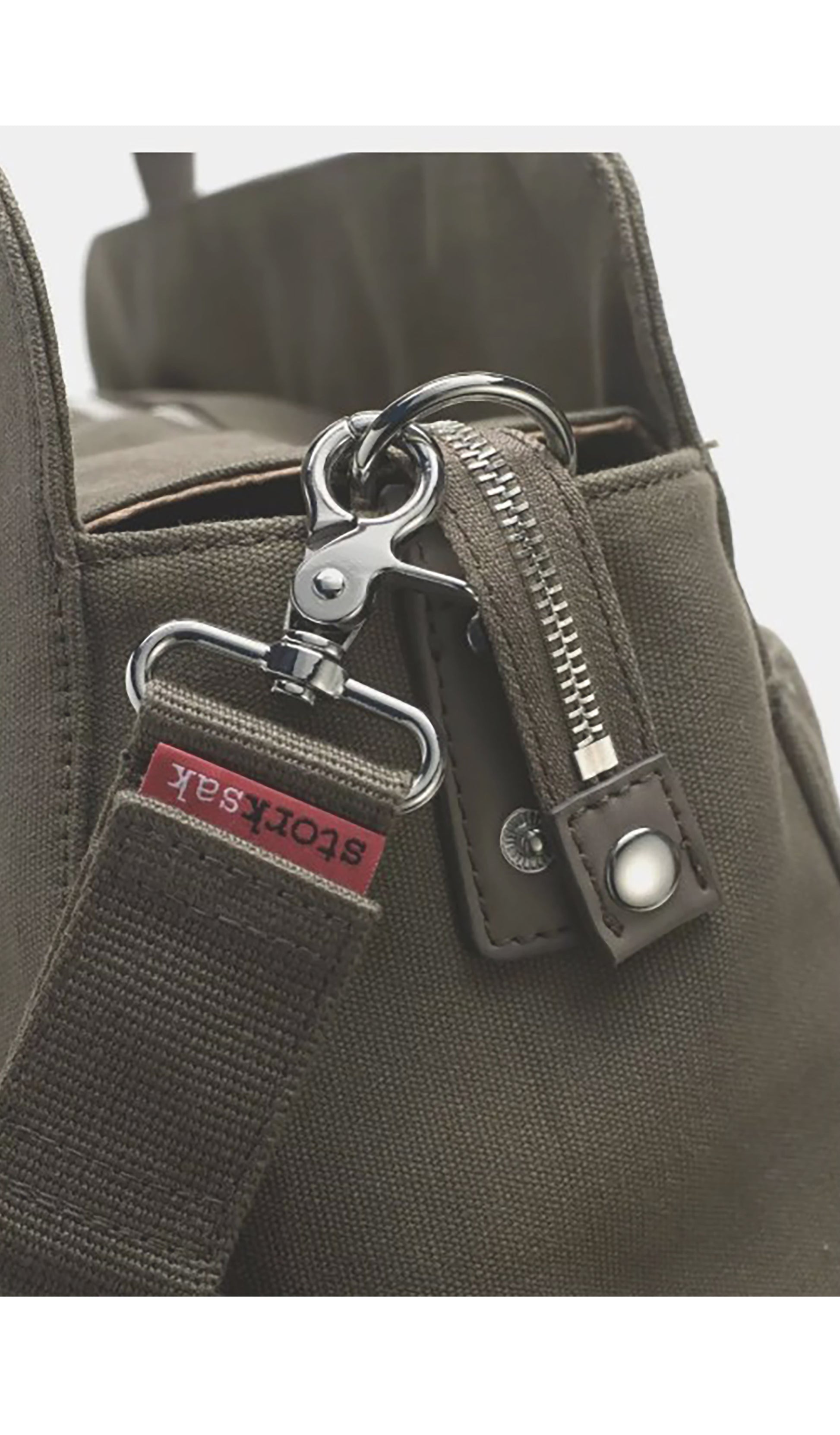 Storksak Juliette Diaper Bag Moss detail  image of the hardware.