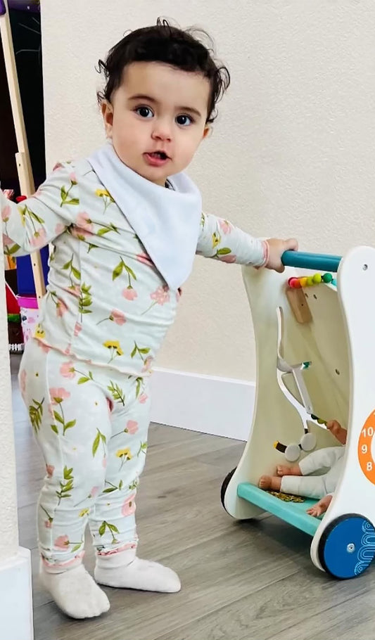 Carnation Charlie Baby 3-Piece Pant PJ worn by baby girl playing. Headwrap not shown.