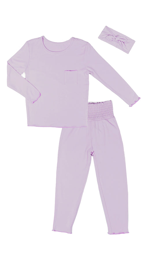 Lavender Charlie Kids 3-Piece Pant PJ. Long sleeve top with smocked waistband pant and matching headwrap. Lettuce trim detail on sleeve edge, top and pant hem.