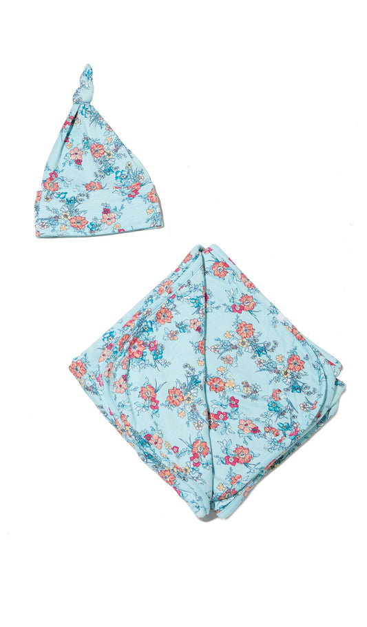 Azure Mist Swaddle 2-Piece Set. Flat shot of a folded baby blanket with matching knotted baby hat.