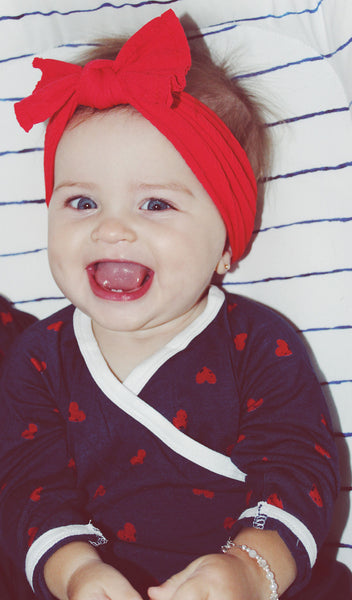 Hearts Baby's Take-Me-Home 4 Piece set close up image of baby girl wearing kimono top with red headwrap.
