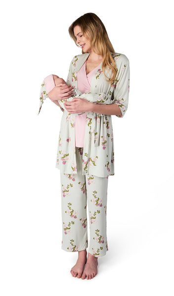 Peony Analise 5-Piece Set. Woman wearing 3/4 sleeve robe, tank top and pant while holding a baby wearing baby gown and knotted baby hat.
