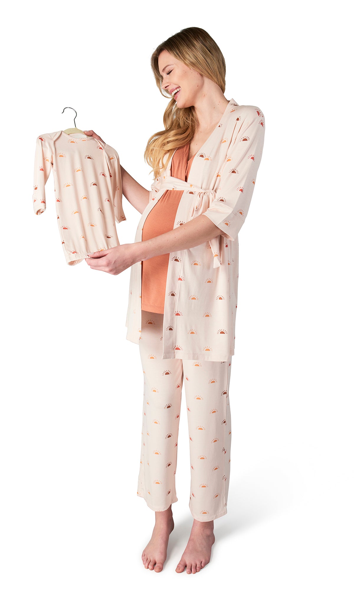 Sunrise Analise 5-Piece Set. Pregnant woman wearing 3/4 sleeve robe, tank top and pant while holding a baby gown.