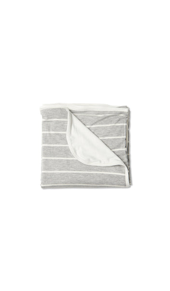 Heather Grey Swaddle Blanket folded into a square with print showing on one side and reversible contrast solid showing on other side of fold down flap.