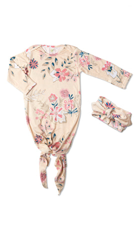 Wild Flower Knotted Gown 2-Piece flat shot showing long sleeve baby gown with hem tied into a tie-knot bow and matching headwrap.