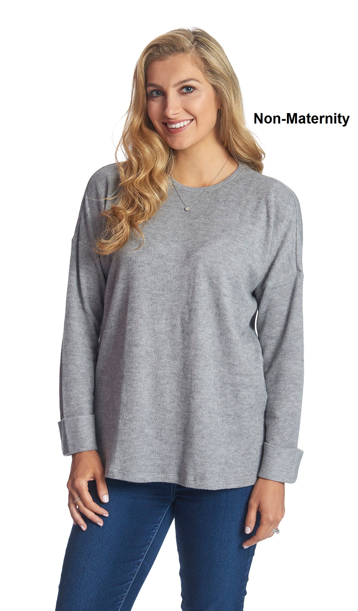 Heather Grey Andria full length shot of sweater worn by woman as non-maternity style with medium denim jeans.