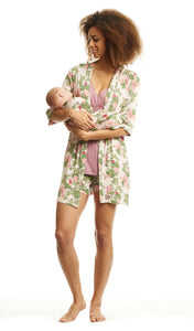 Beige Floral Adalia 3-Piece Set. Woman wearing 3/4 sleeve robe, tank top and short while holding a baby wearing matching baby gown.