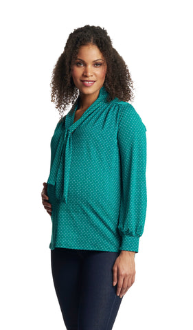 Emerald Dot Vanessa top worn by pregnant woman with one hand on her belly.