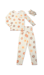 Daisies Charlie Baby 3-Piece Pant PJ. Long sleeve top with smocked waistband pant and matching headwrap. Lettuce trim detail on sleeve edge, top and pant hem.
