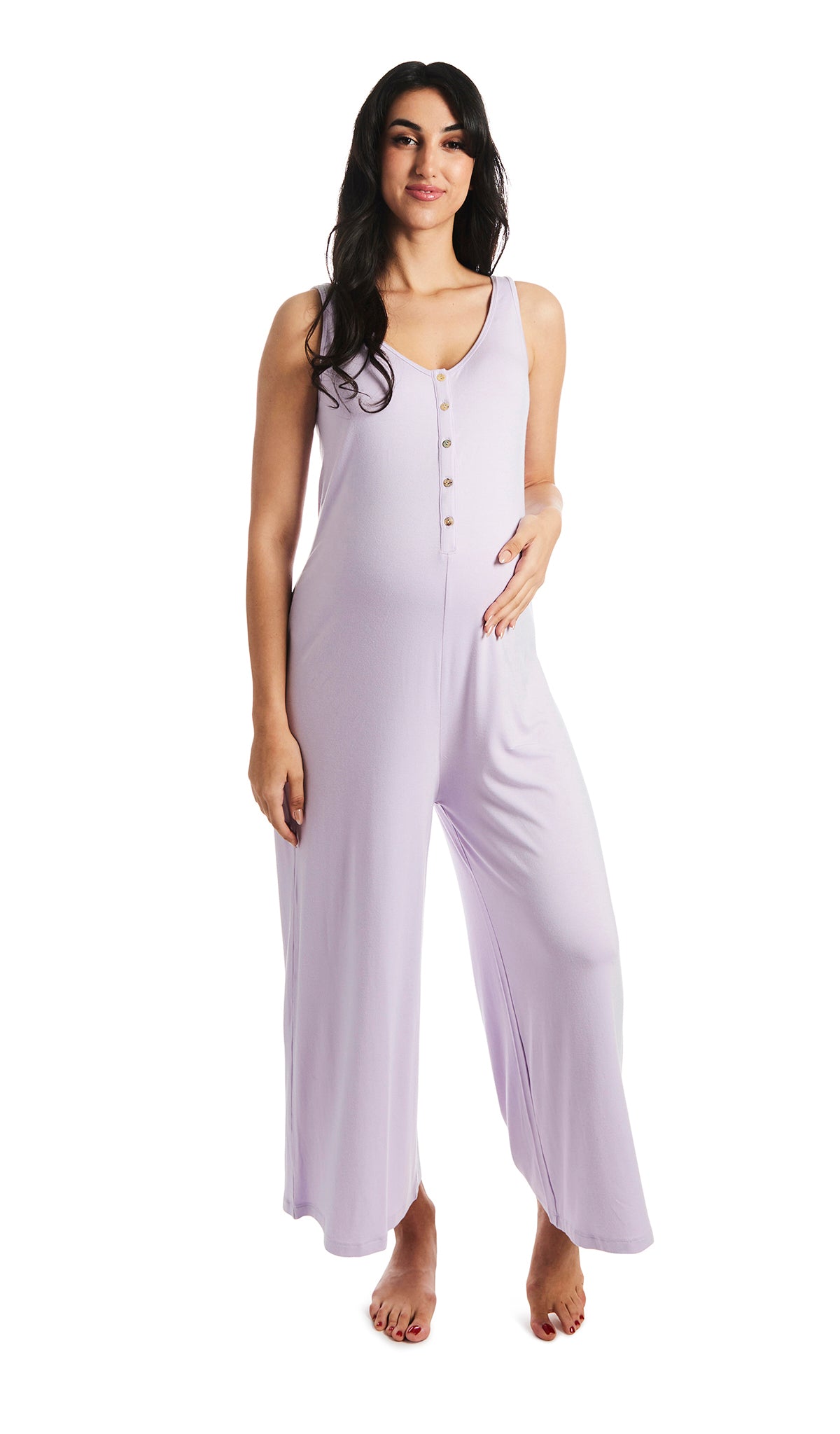 Lavender Luana romper. Pregnant woman with one hand on belly, wearing sleeveless wide-leg romper with scoop-neckline with button-front placket. 