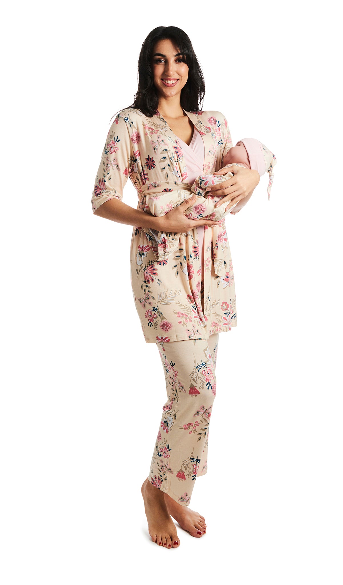 Wild Flower Analise 5-Piece Set. Woman wearing 3/4 sleeve robe, tank top and pant while holding a baby wearing baby gown and knotted baby hat.