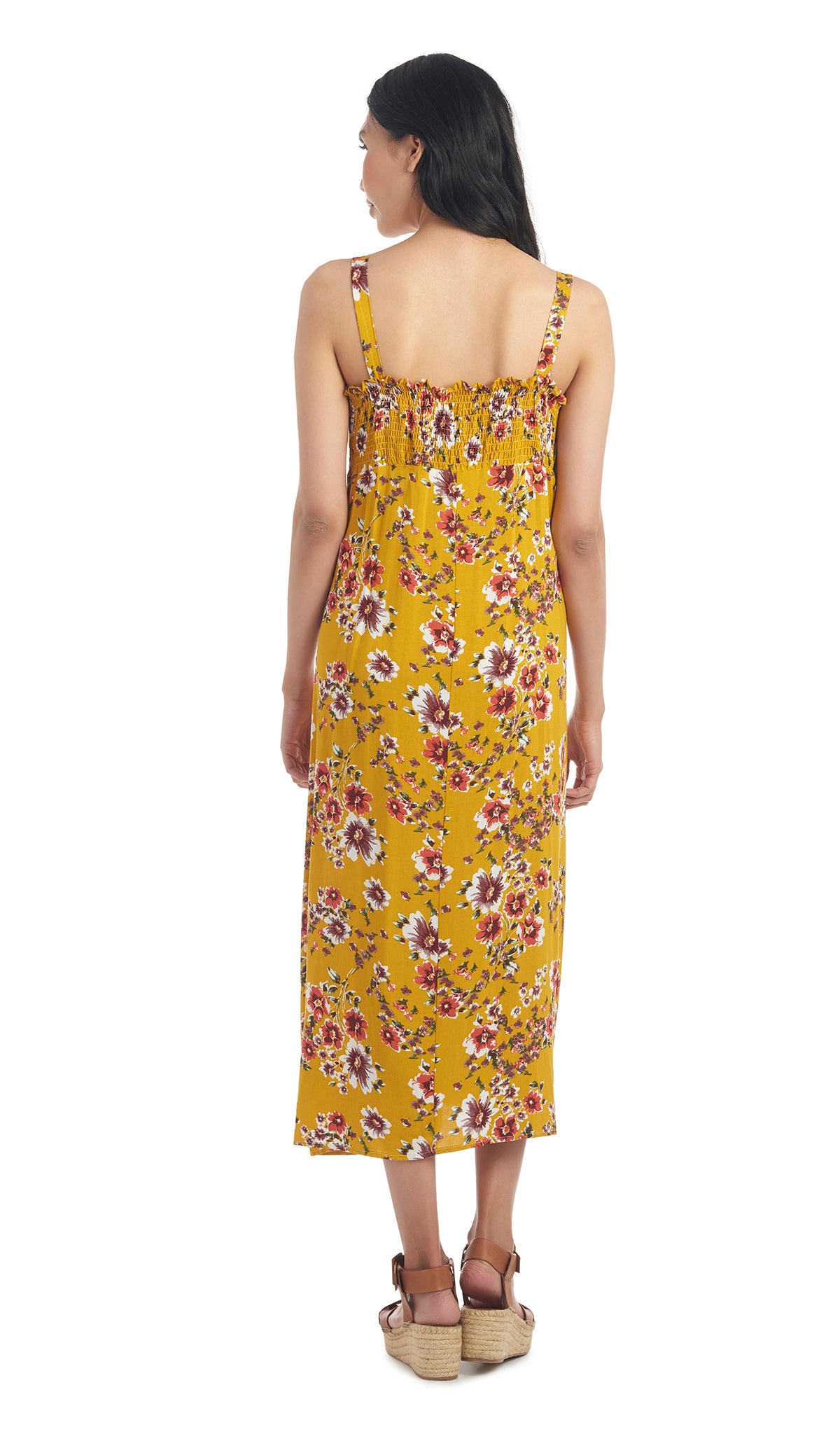 Rust Floral Savannah back shot of woman wearing dress with elastic back smocking detail.