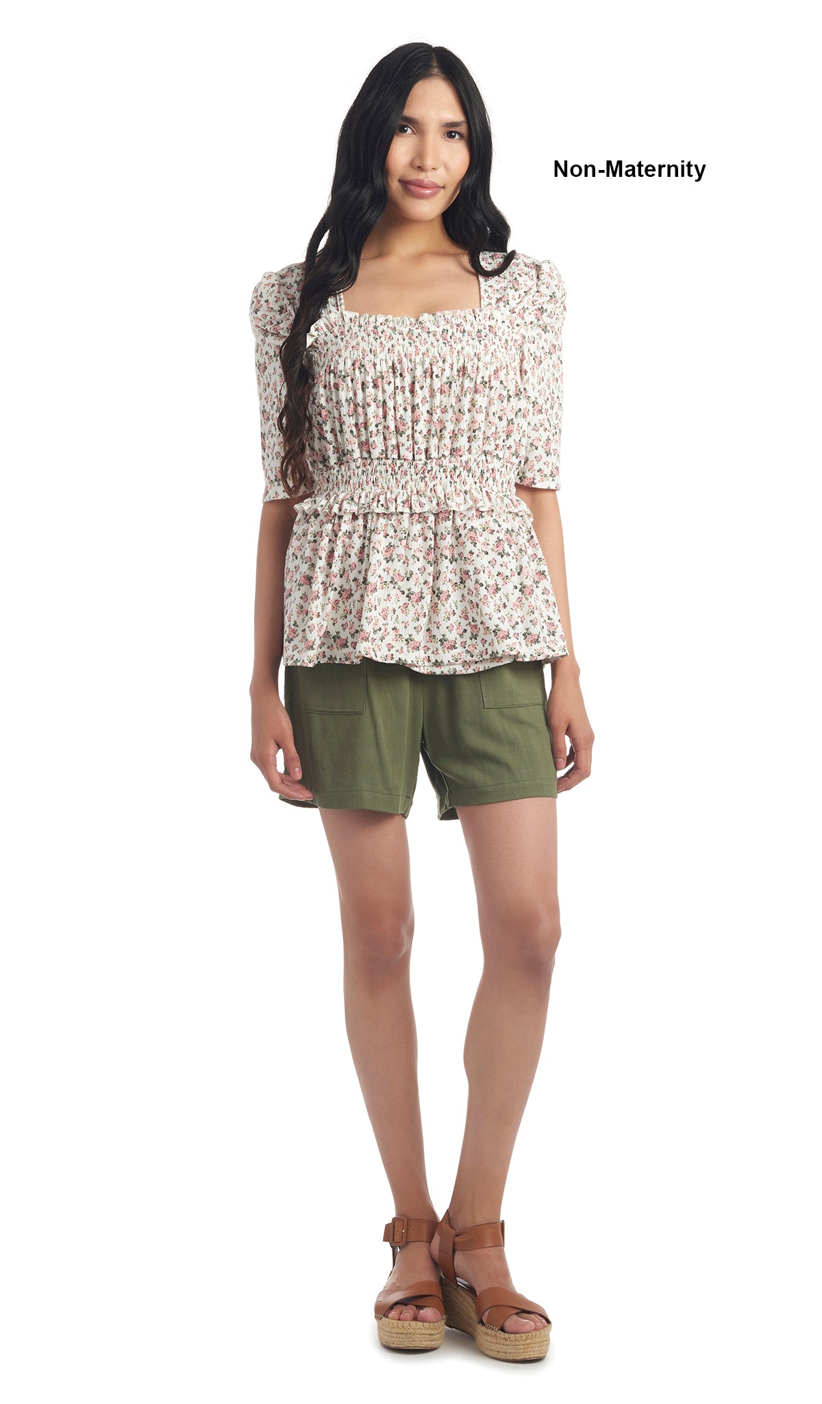 Ivory Floral Tracey top worn by woman as non-maternity style with olive shorts.