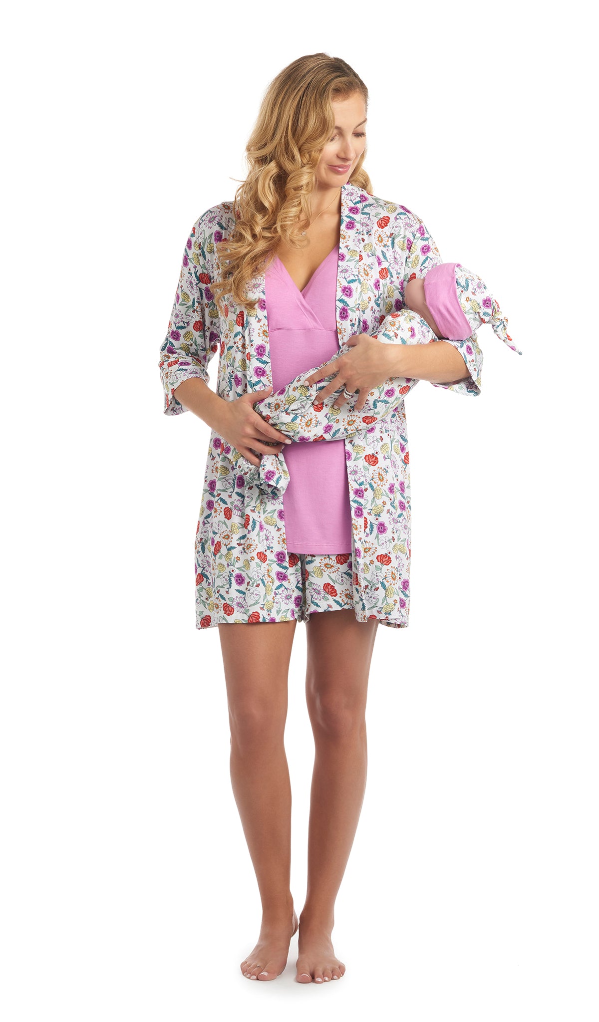 Zinnia Adaline 5-Piece Set. Woman wearing 3/4 sleeve robe, tank top and short while holding a baby wearing baby gown and knotted baby hat.