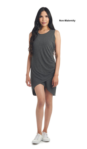 Charcoal Tamara dress worn as non-maternity style by woman standing with arms down to side.