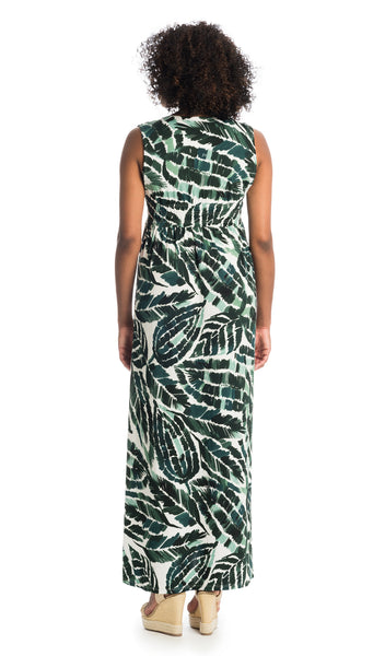 Palm Valeria back shot of dress worn by woman wearing wedge sandal heels.