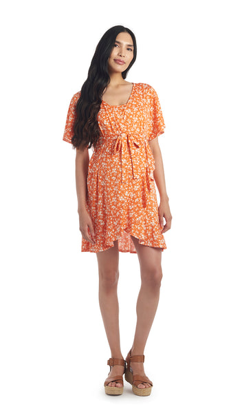 Citrus Floral Kristi Dress worn by pregnant woman wearing tan wedge sandals.