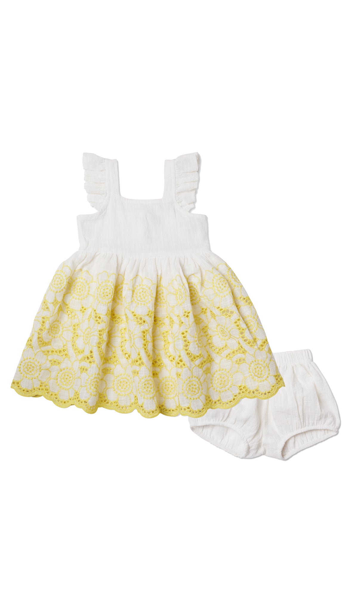 Ivory/Yellow Eyelet Baby Dress. Flat shot of eyelet dress laying over the matching diaper cover.