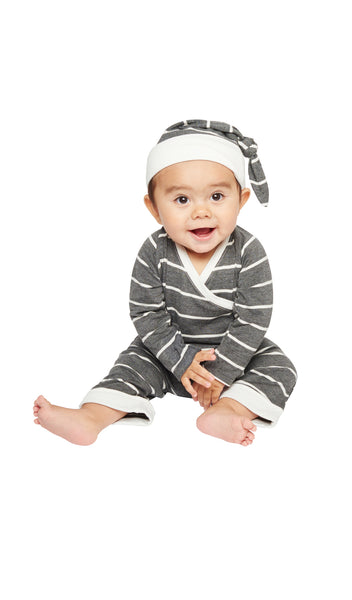 Charcoal Baby's Take-Me-Home 3 Piece set on baby sitting while smiling.