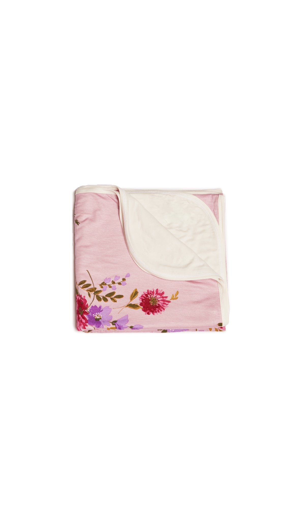 Dusty Rose Swaddle Blanket folded into a square with print showing on one side and reversible contrast solid showing on other side of fold down flap.