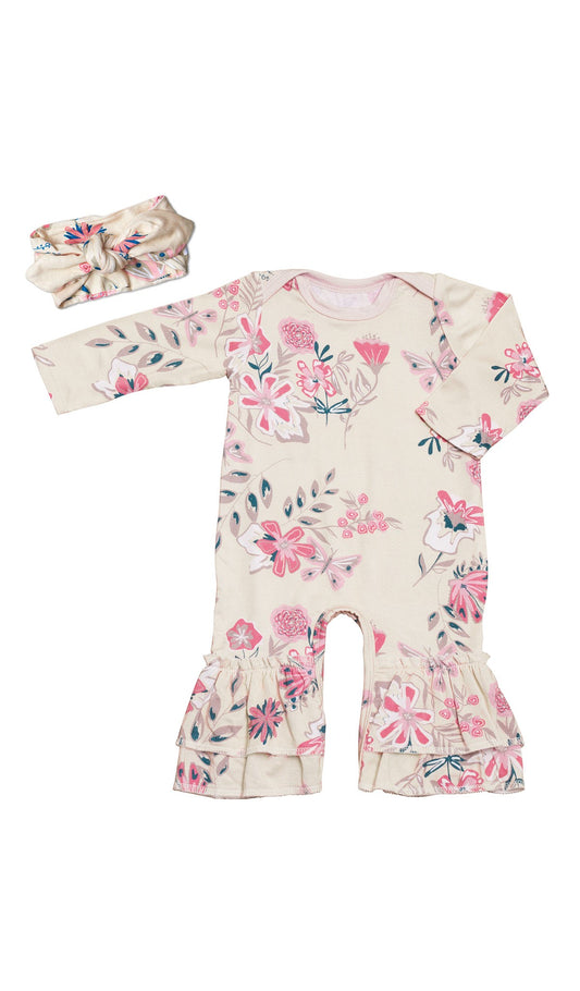 Wild Flower Ruffle Romper 2-Piece. Flat shot of long sleeve romper with ruffles on legs and matching headwrap.