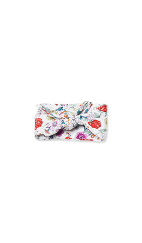 Zinnia Baby/Kids Headwrap. Flat shot with headwrap tied into a tie-knot bow.