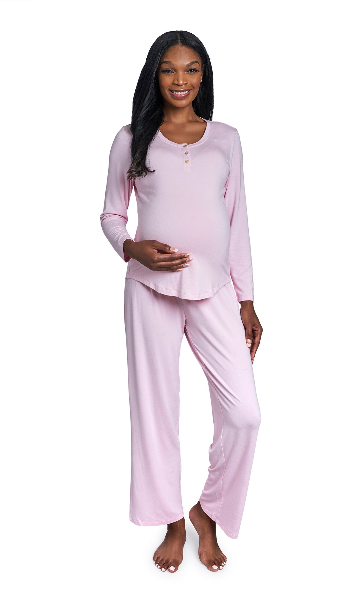 Blush Laina 2-Piece Set. Pregnant woman wearing button front placket long sleeve top and pant with one hand on belly.