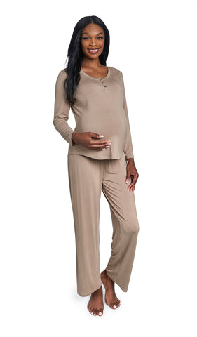 Latte Laina 2-Piece Set. Pregnant woman wearing button front placket long sleeve top and pant with one hand on belly.