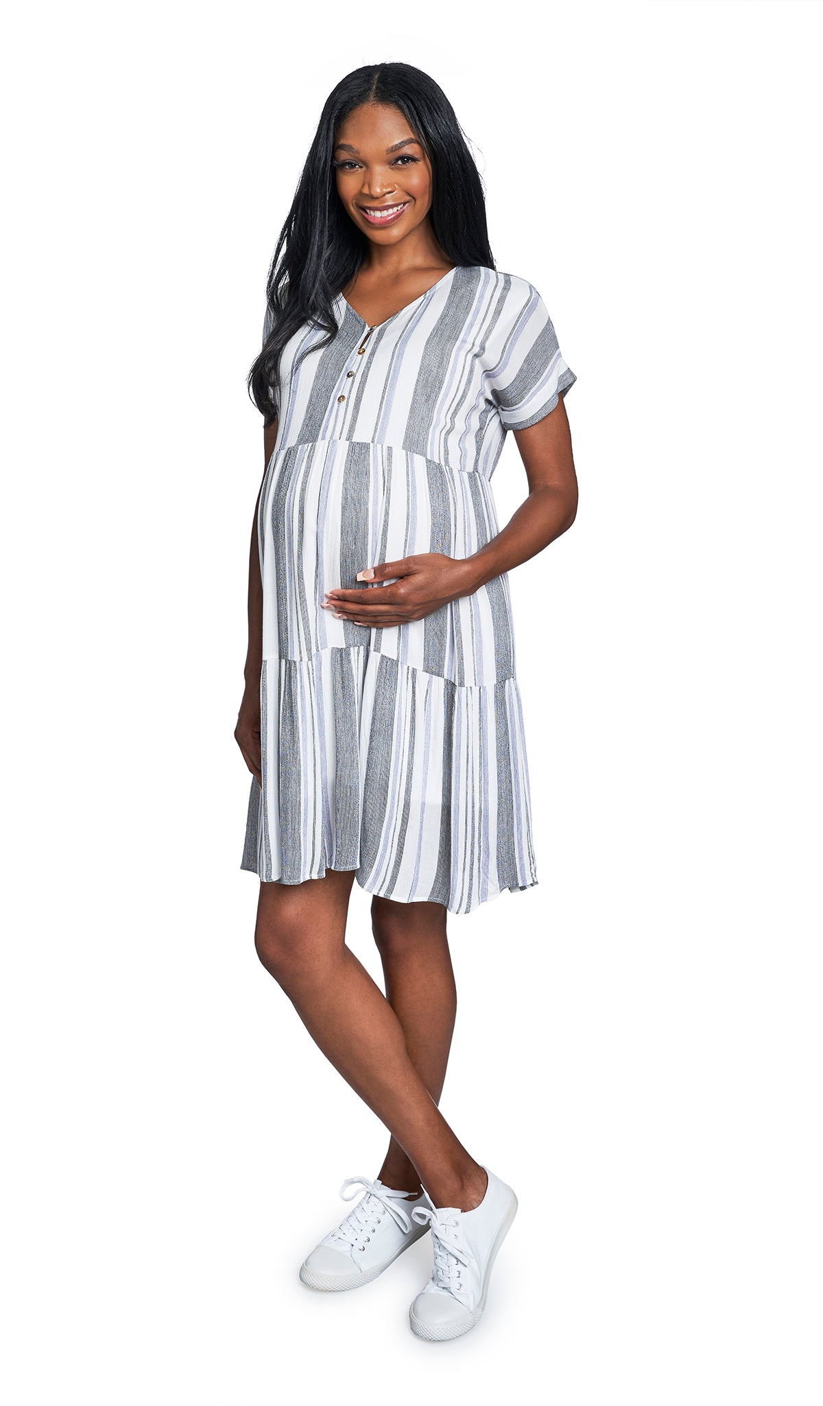 Black/Royal Micaela dress worn by pregnant woman with one hand on her belly.