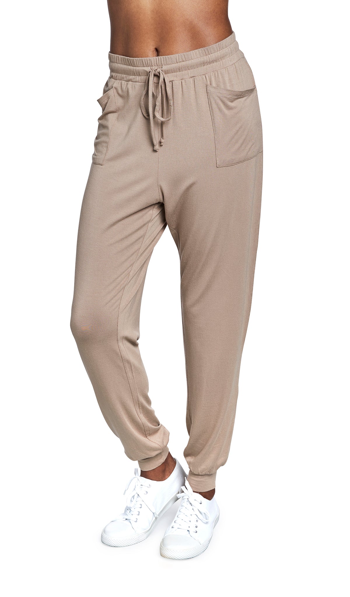 Latte Carmen Jogger on figure, waist down with two front pockets, elastic drawstring waist and cuff hem.