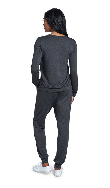 French Terry Charcoal Whitney 2-Piece back view on figure showing long sleeve top and long pant with cuff hem.