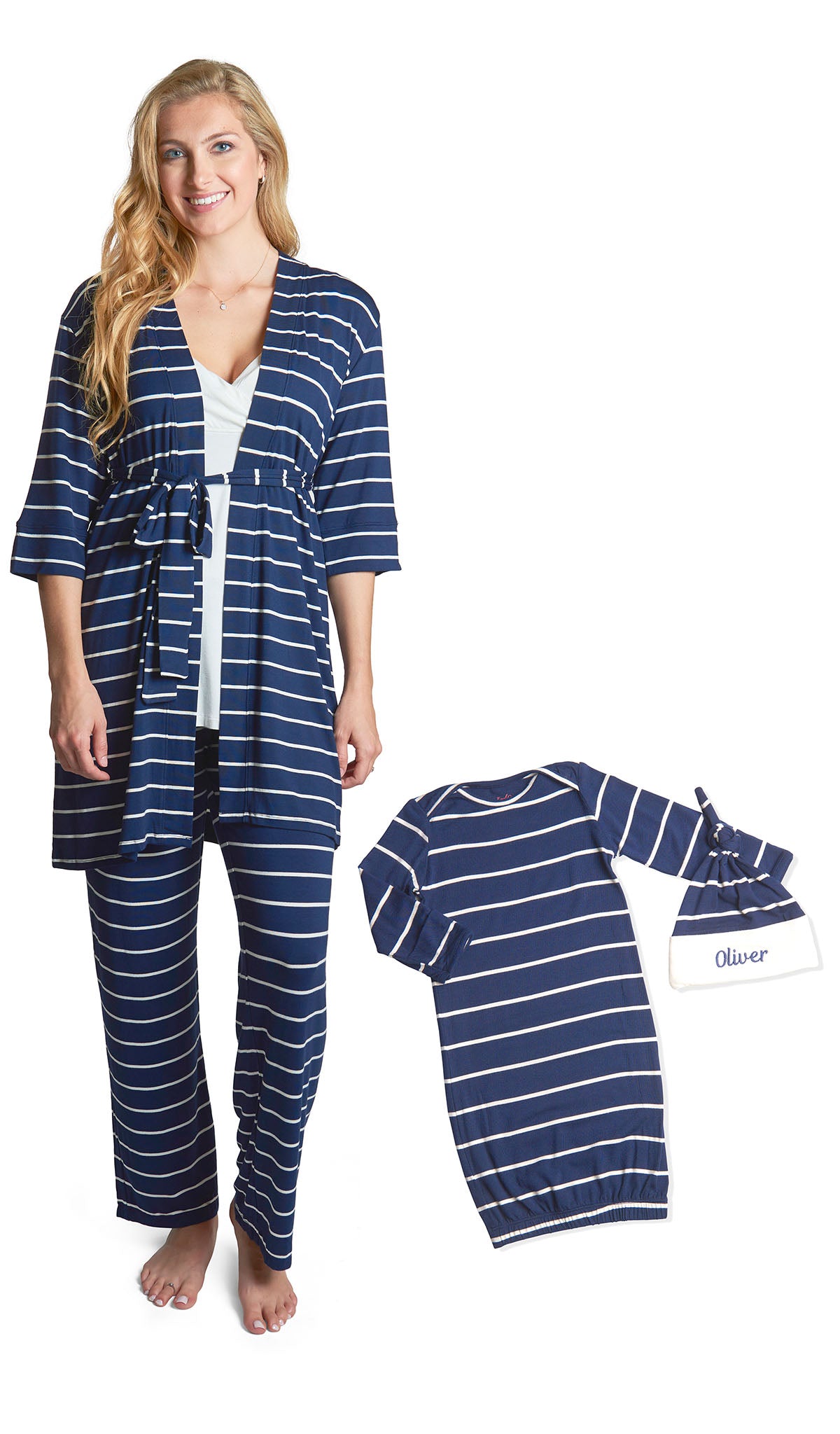 Navy Analise 5-Piece Set. Woman wearing 3/4 sleeve robe, tank top and pant with a flat laid baby gown and embroidered baby hat next to her.