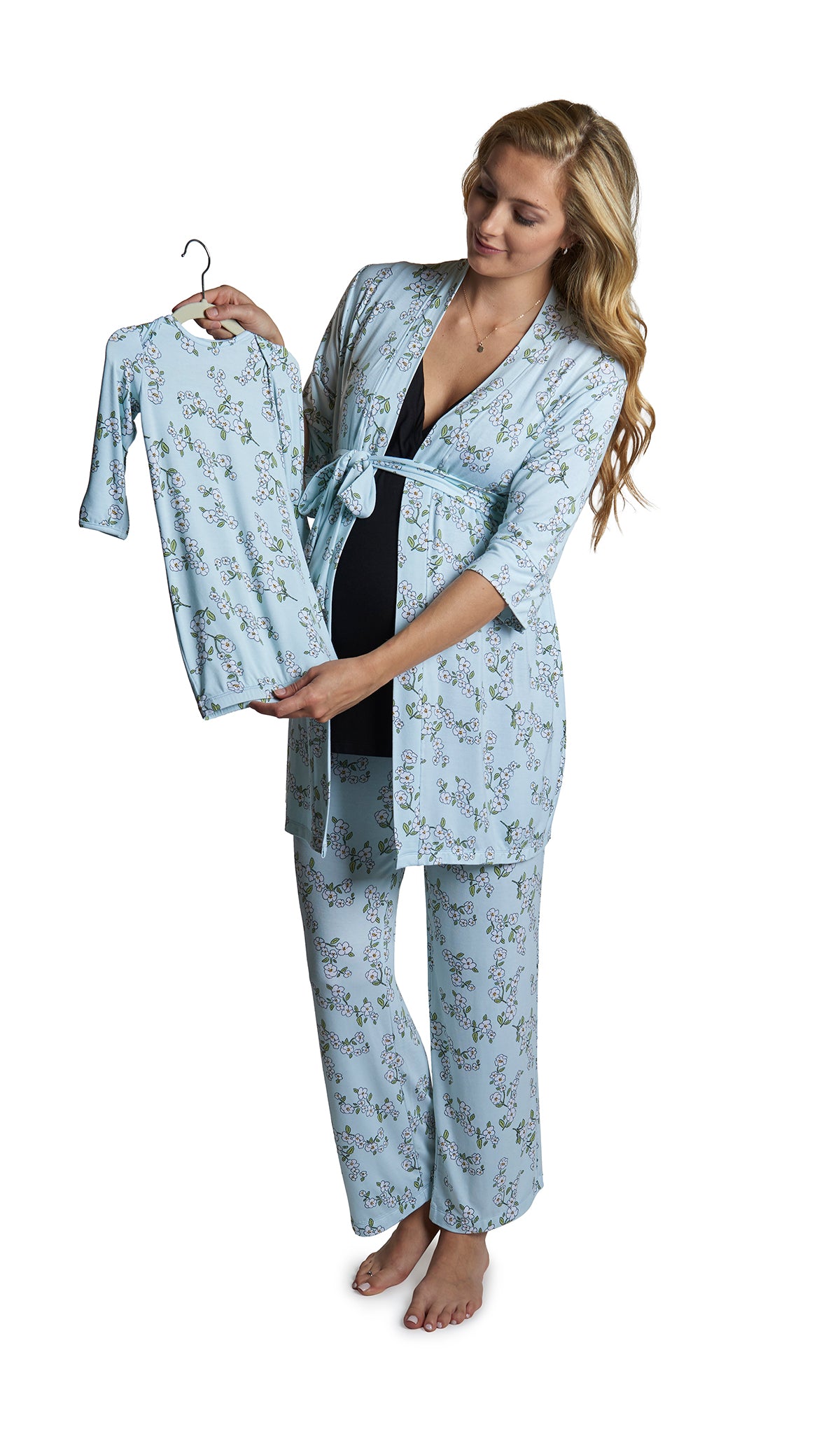 Baby's Breath Analise 5-Piece Set. Pregnant woman wearing 3/4 sleeve robe, tank top and pant while holding a baby gown.